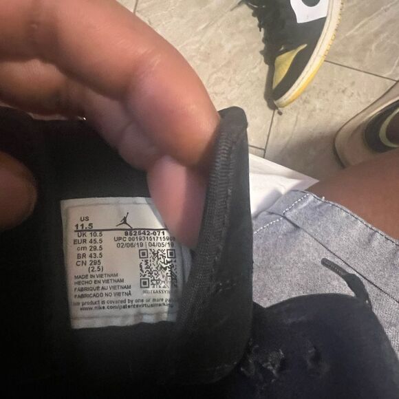 Jordan 1 Yellow and Black Toe Mid